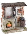 Bottega del fabbro con fuoco a batteria cm 11,5x4x12,5 h Mondo